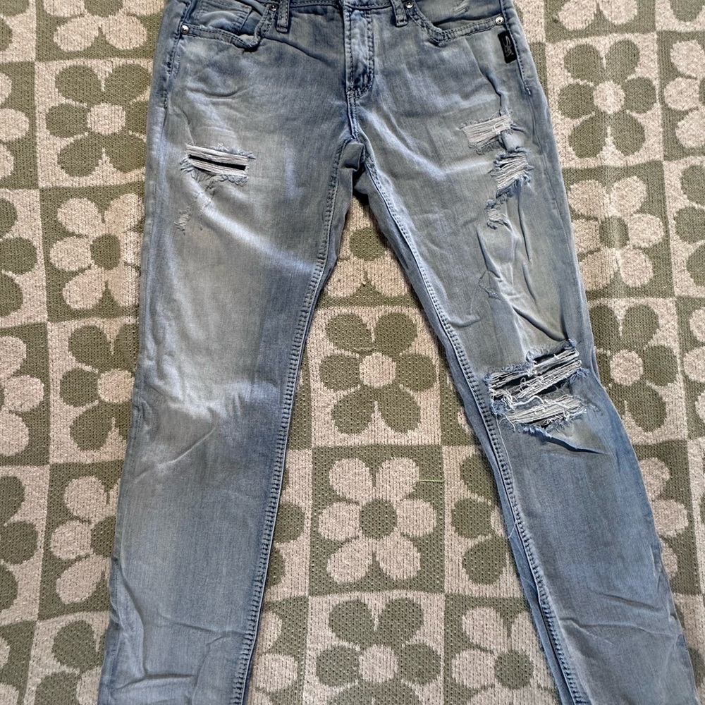 Distressed silver Jeans